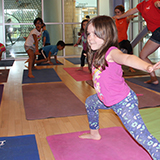 young girl summer camp yoga