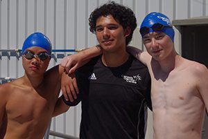 Summer swim boys and coach